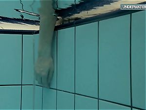 Loris blackhaired nubile swirling in the pool
