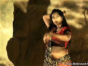 Indian dark haired Dance Gracefully